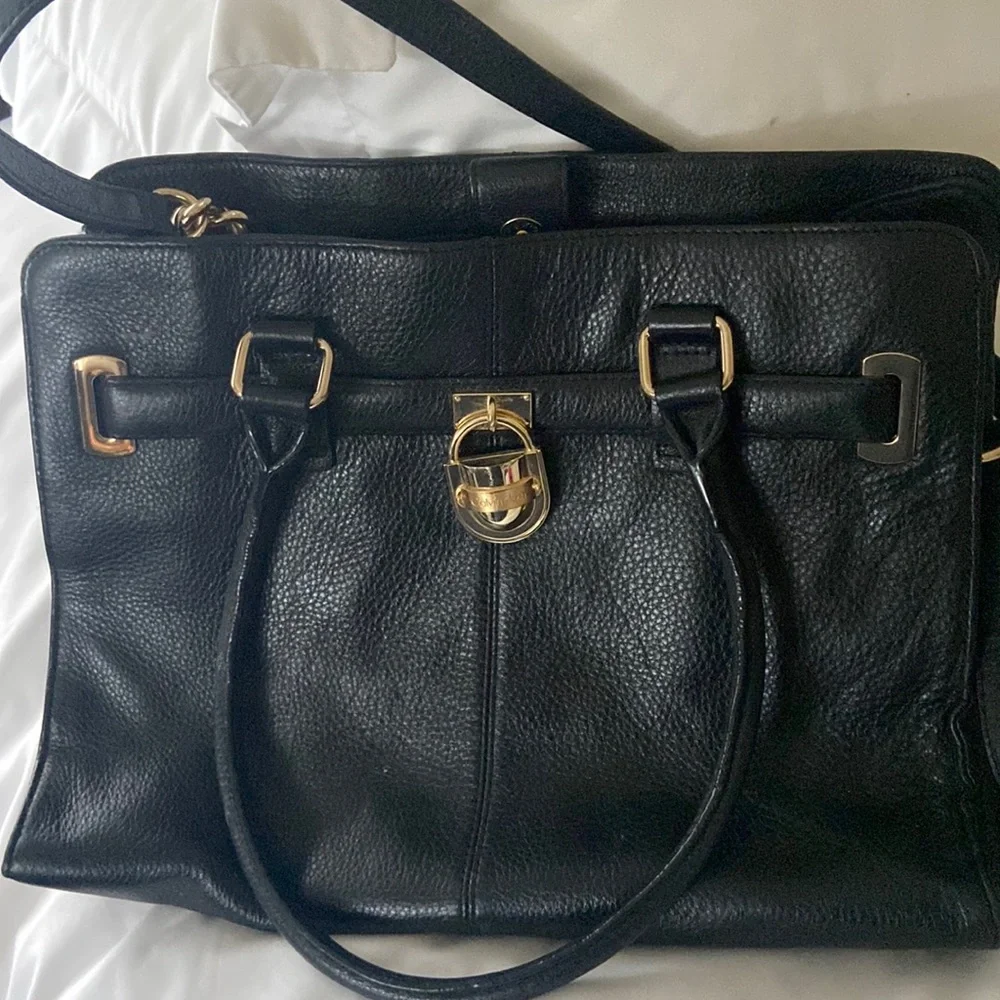 Calvin Klein used black leather bag. Two short straps and one long strap. - Picture 1 of 4